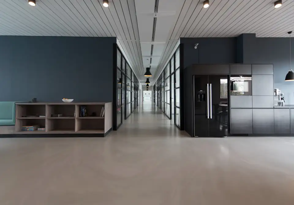 Office corridor with glass partitions
